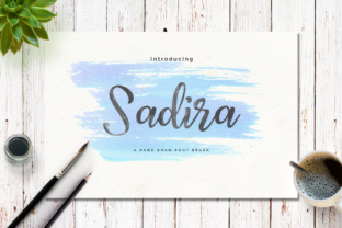 Discover the Elegance of Sadira: A Hand-Drawn Brush Font